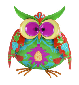 Colourful treetop mottled owls table decor