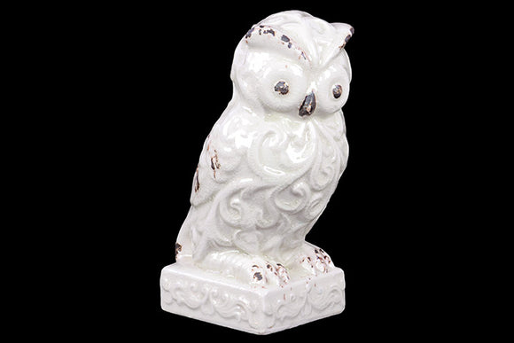 Attentive Ceramic Owl Figurine with Wide Open Eyes and Embellished with Beautiful Motifs on Stand in White